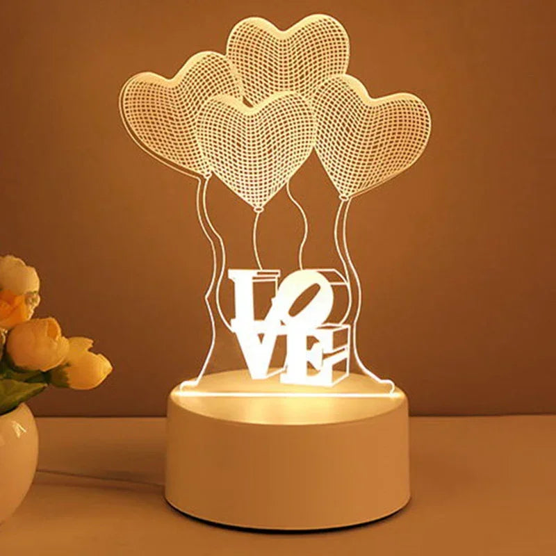 LED acrylic table lamp with heart-shaped balloon design and 'LOVE' text, warm light