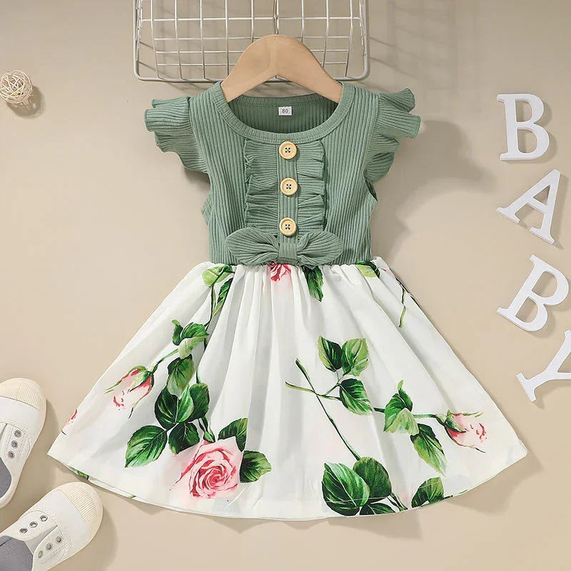 Green ribbed short sleeve baby dress with buttons and floral print white skirt