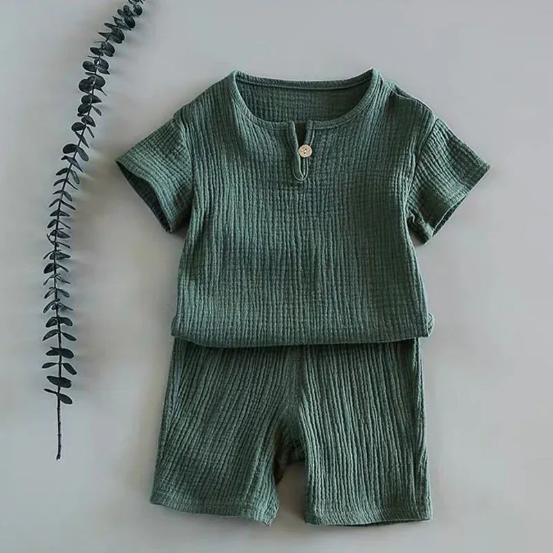 Green short sleeve textured cotton shirt and shorts set, relaxed fit, minimalist style