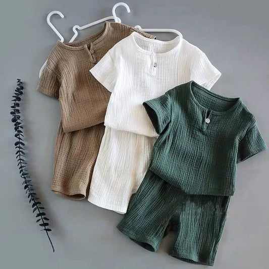 Three short-sleeve, cotton gauze two-piece lounge sets in green, white, and brown
