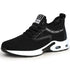 Black mesh athletic sneaker with cushioned sole and lace-up design, modern streetwear shoe.