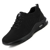 All-black mesh athletic sneaker with cushioned sole and lace-up closure, modern streetwear style
