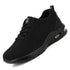 All-black mesh athletic sneaker with cushioned sole and lace-up closure, modern streetwear style