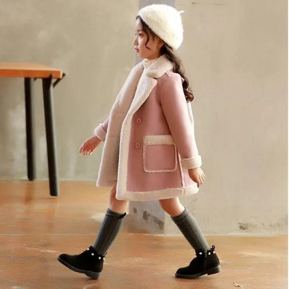 Girl in a pink faux shearling coat, white beret, knee-high socks, and black boots