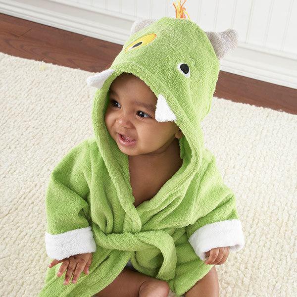 Baby wearing green hooded terry cloth robe with monster design, soft relaxed fit