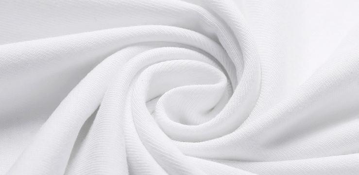 Close up of soft white cotton fabric with smooth texture and lightweight material