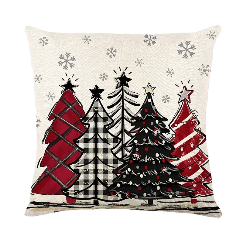 Festive pillow cover with red, black, and plaid Christmas trees and snowflake accents