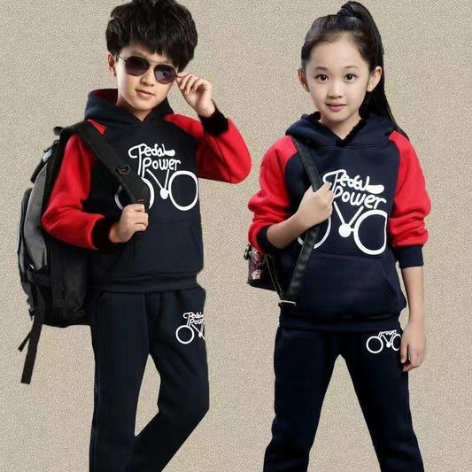Kids wearing navy blue and red casual hoodie tracksuits with graphic text, relaxed fit.