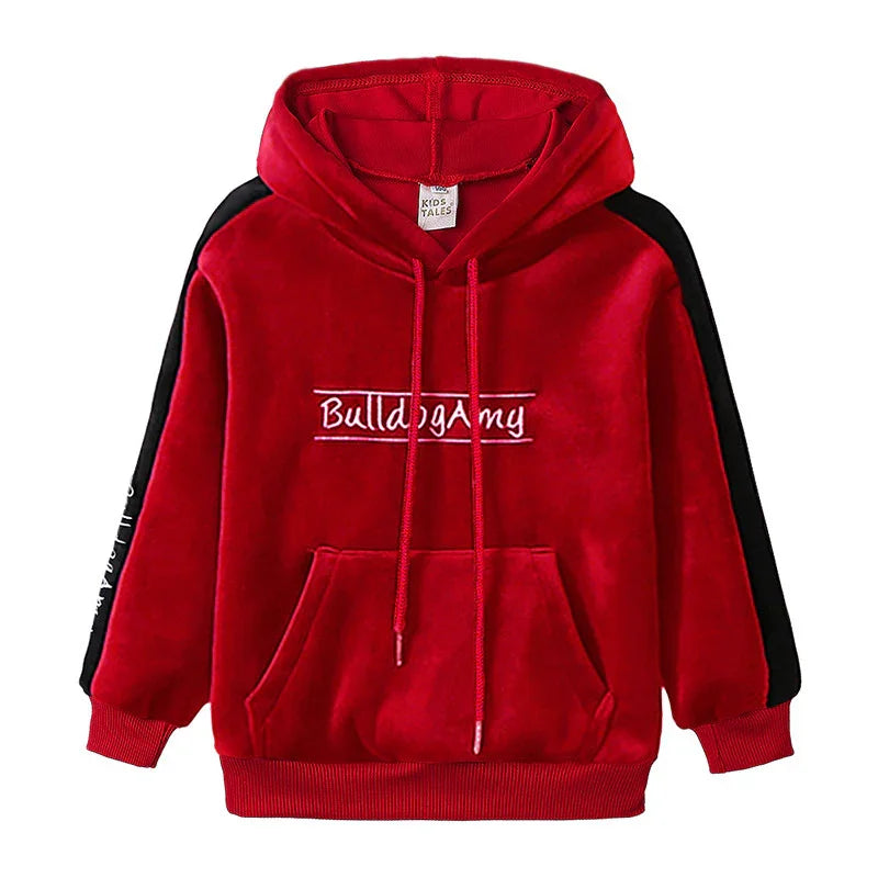 Red velvet hoodie with black sleeve stripes, front pocket, and relaxed fit