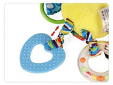 Soft yellow plush toy with blue silicone teether, colorful fabric, and plastic rattle rings