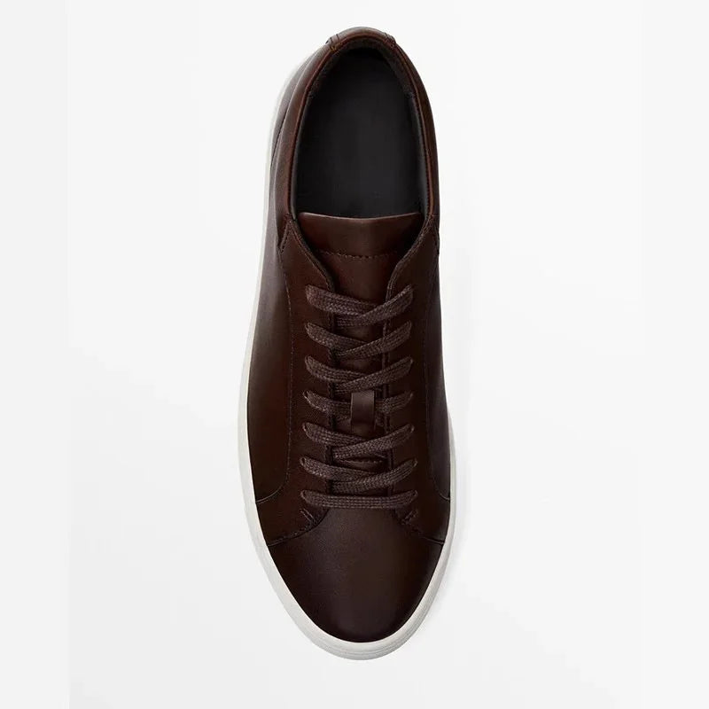 Brown leather low-top sneaker with white sole, minimalist design, classic fit