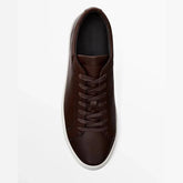 Brown leather low-top sneaker with white sole, minimalist design, classic fit