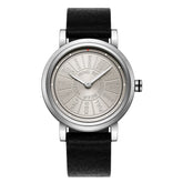 Minimalist silver watch with unique engraved dial and black leather strap, modern style.