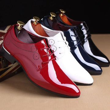 Glossy patent leather dress shoes in red, white, and navy, pointed toe, lace-up style.