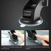 Black plastic car dashboard mount with adjustable suction cup base and locking mechanism