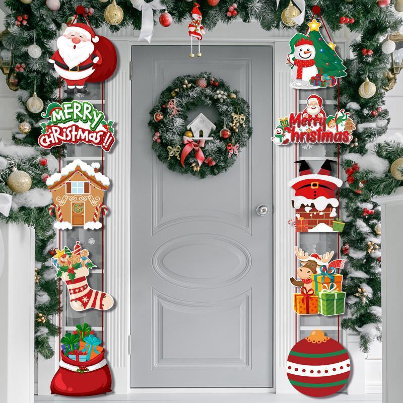 Christmas-themed door decorations with Santa, snowman, and presents in festive colors