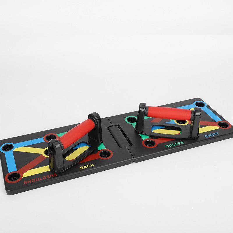 Push-up board with color-coded positions and red handles for targeted muscle workouts