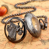 Black metallic pocket watch with engraved Pegasus design and filigree details on a chain