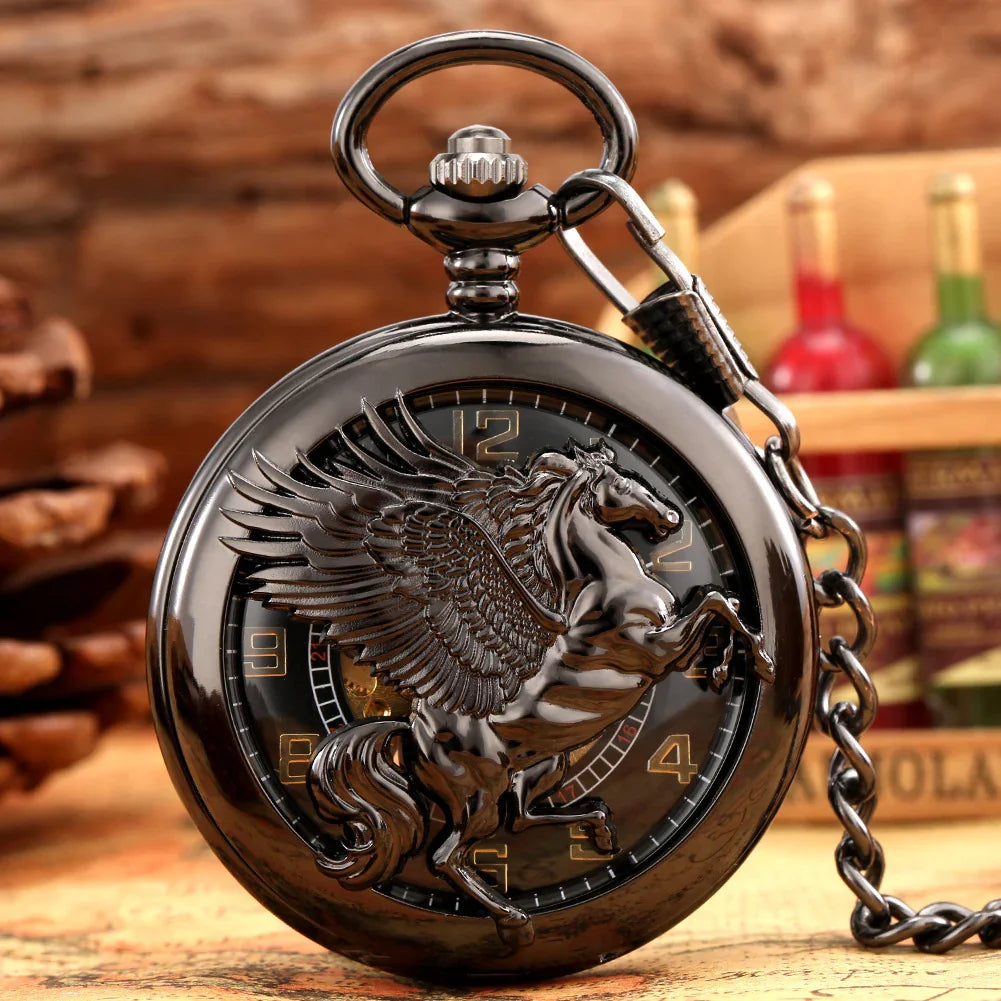 Black metal pocket watch with embossed winged horse, vintage style, chain attached
