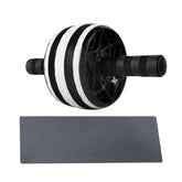 Black and white ab roller with foam handles and a textured exercise mat