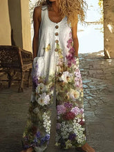 Sleeveless wide-leg floral jumpsuit with button front, loose fit, and large pockets.