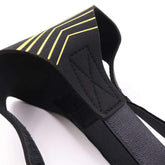 Black adjustable strap with yellow geometric lines, soft neoprene material, modern design
