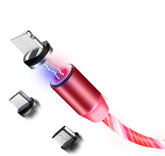 Red magnetic charging cable with interchangeable USB connectors, tech accessory on white background