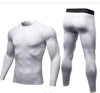 White textured compression shirt and leggings, form-fitting athletic wear for active lifestyles