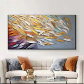 Modern sectional sofa with orange and gray pillows, velvet upholstery, in a stylish living room