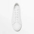 Minimalist white leather sneaker with lace-up design and low-top fit on white background