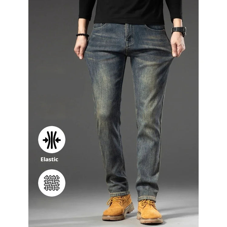 Slim-fit elastic blue jeans with faded wash, stretch denim material, casual style