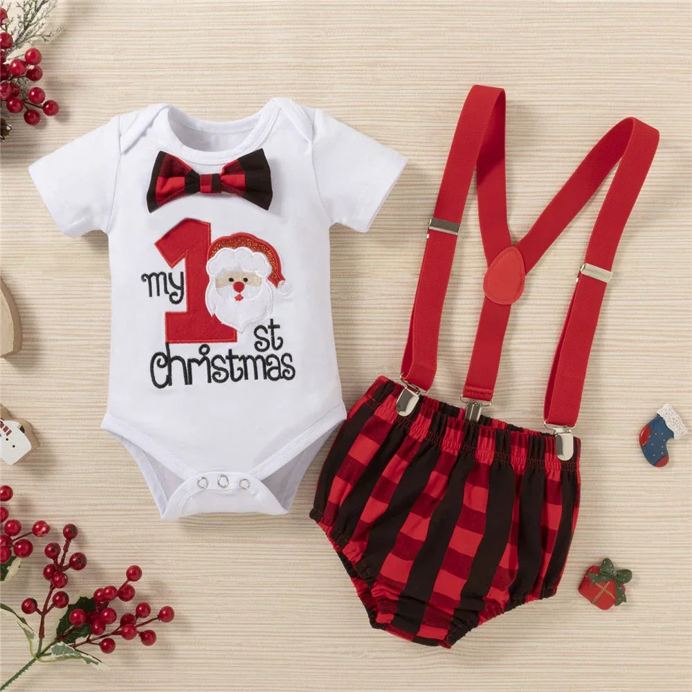 Baby Christmas outfit with white short-sleeve bodysuit, red plaid bow tie, and red suspenders shorts