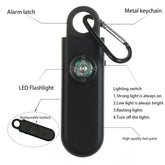 Black personal safety alarm with LED flashlight, metal keychain, and replaceable battery.