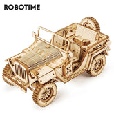 Laser-cut wooden jeep model with intricate details and realistic wheels, beige color, assembled kit.