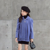 Girl in a loose-fitting light purple wool coat with button details and black beret