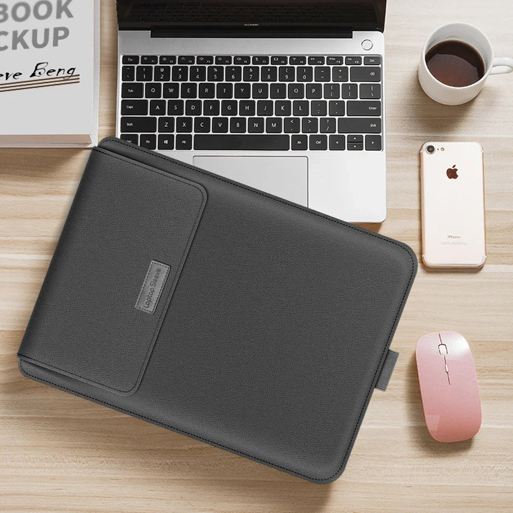 Slim black leather laptop sleeve on desk, minimalist design, snug fit, modern workspace
