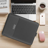 Slim black leather laptop sleeve on desk, minimalist design, snug fit, modern workspace