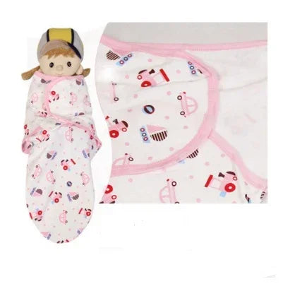 Soft cotton baby swaddle blanket in white with pink trim and playful car print, snug fit