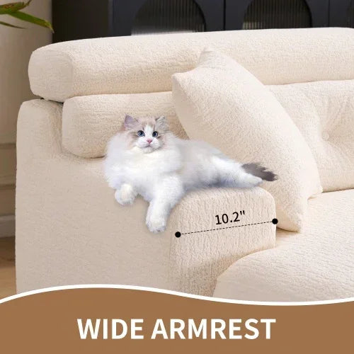 Cream textured fabric sofa with wide armrest, relaxed fit, featuring a lounging cat