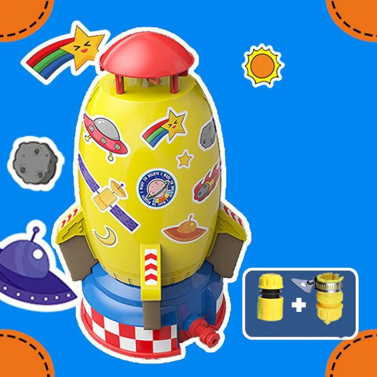 Colorful plastic toy rocket with space-themed stickers and sprinkler attachments