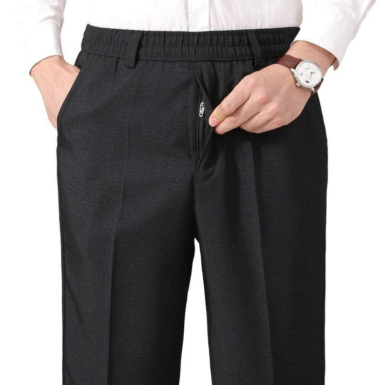 Black straight-leg pants with elastic waistband and front zipper, relaxed fit