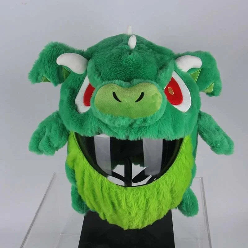 Green plush dragon helmet cover with red eyes, faux fur material, playful novelty style