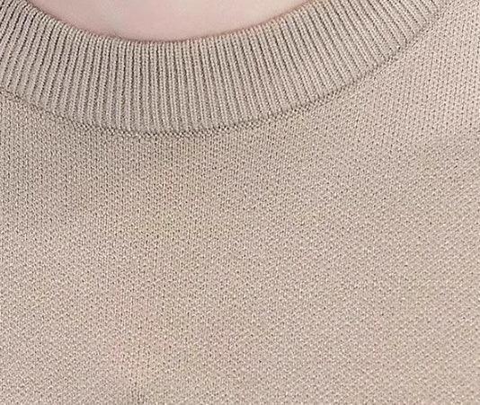 Beige knit crew neck sweater, soft texture, regular fit, close-up detail