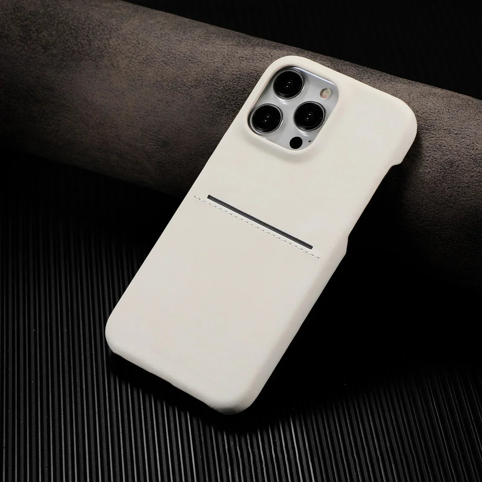 Minimalist white phone case with card slot, smooth texture, slim fit, modern design