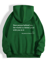 Green oversized hoodie with white motivational text, casual streetwear style, soft cotton blend