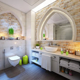 Modern bathroom with marble walls, vessel sink, arched mirror, and lime green accents