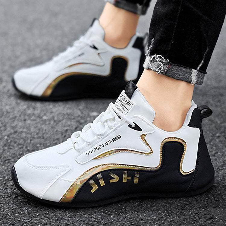 White and black streetwear sneakers with gold accents, synthetic material, athletic fit