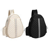 Quilted backpacks in cream and black with vertical stripe accents and side pockets