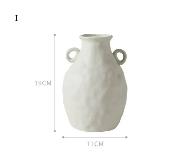Matte white ceramic vase with twin handles, textured surface, 19cm tall, 11cm wide
