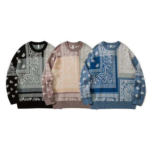 Oversized crewneck sweaters in black, beige, and blue with paisley bandana print pattern